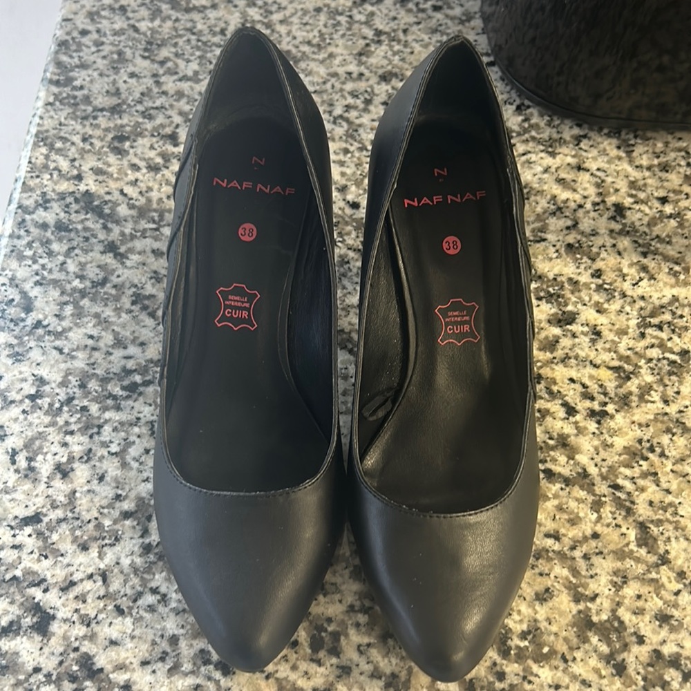 Black heels with scalloped sides